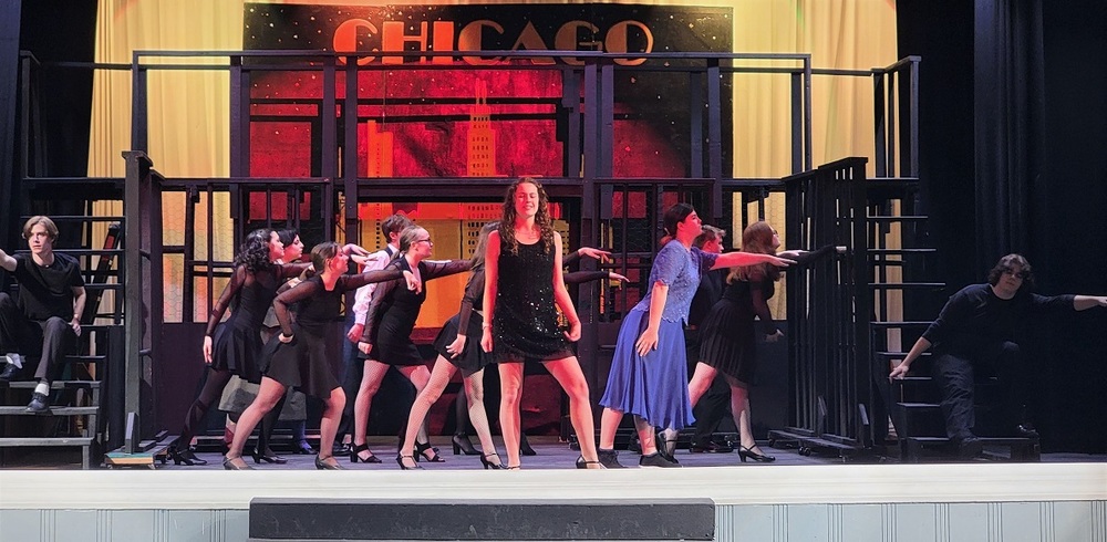 Students rehearsing performance of Chicago