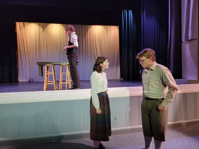 3 students in "Our Town" drama performance